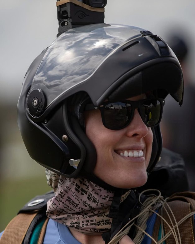 MegDawg smiling in her gear at the dropzone